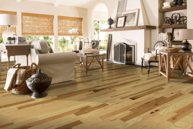 Medium gloss solid hardwood hickory floor in a living room
